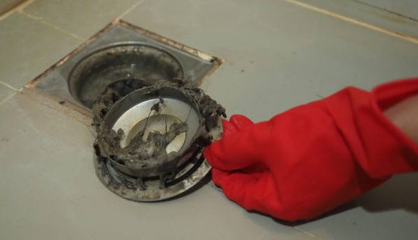 how to unscrew shower drain