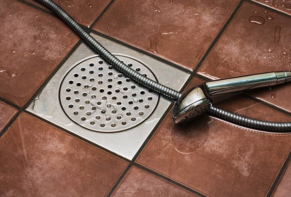 how to unscrew shower drain