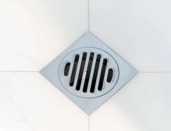 how to unscrew shower drain