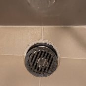 how to unscrew shower drain