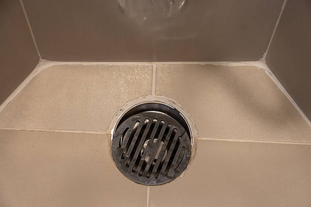 how to unscrew shower drain