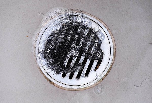 how to unscrew shower drain