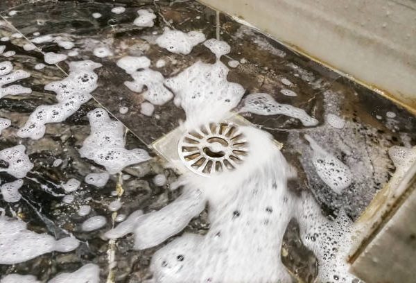 how to unscrew shower drain